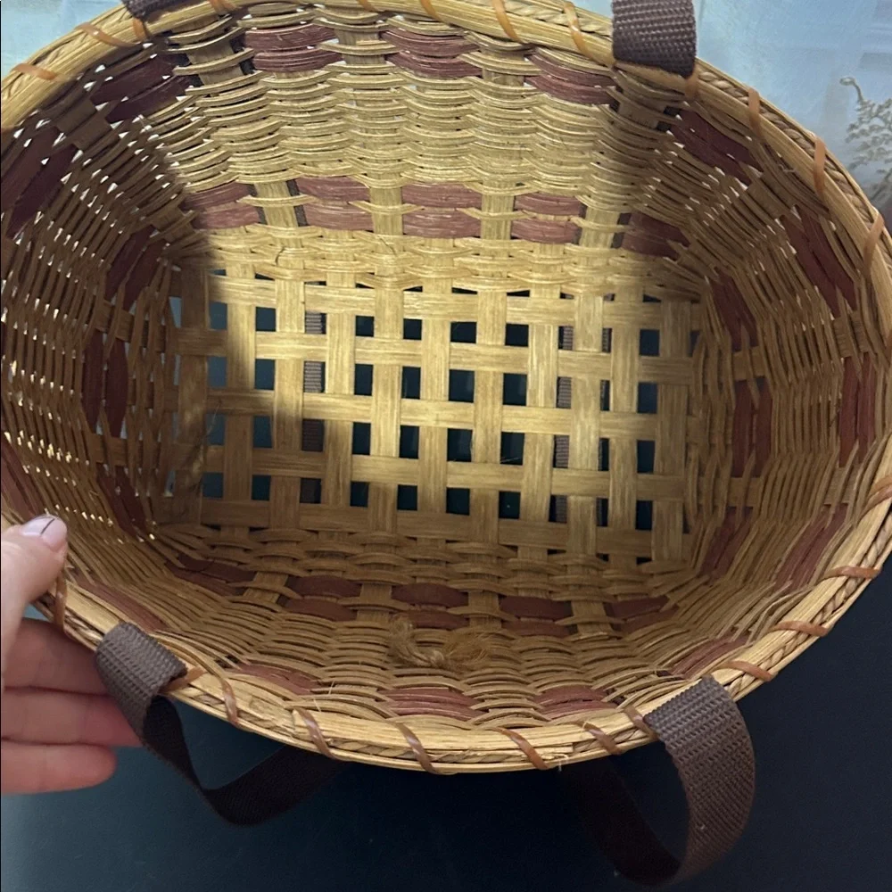 Woven vegetable basket with handles — carrot plaque decor
